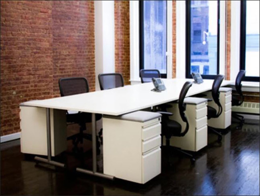 Office Benching Case Study: No Office Partitions, No Desk Dividers Case Study: No Office Partitions, No Desk Dividers
